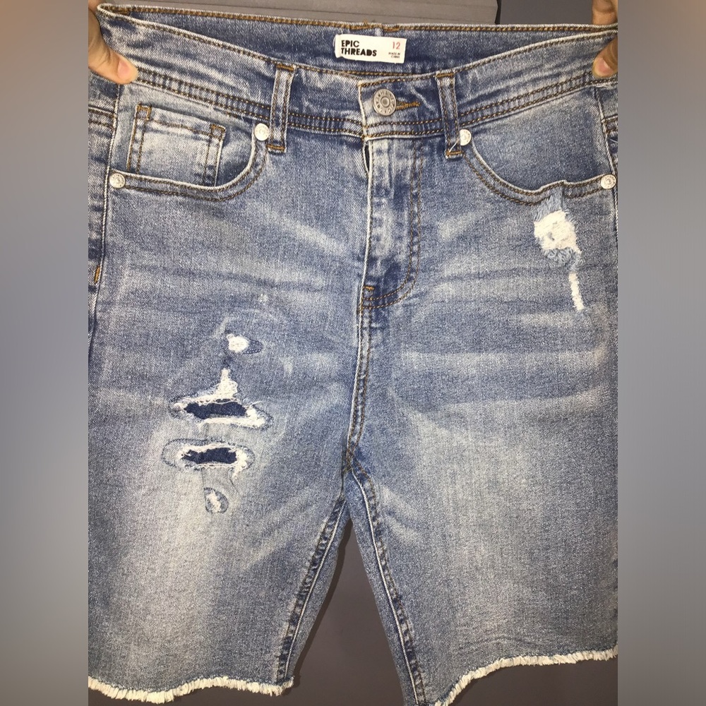 Selling kids long shorts for $20 from epic threads
